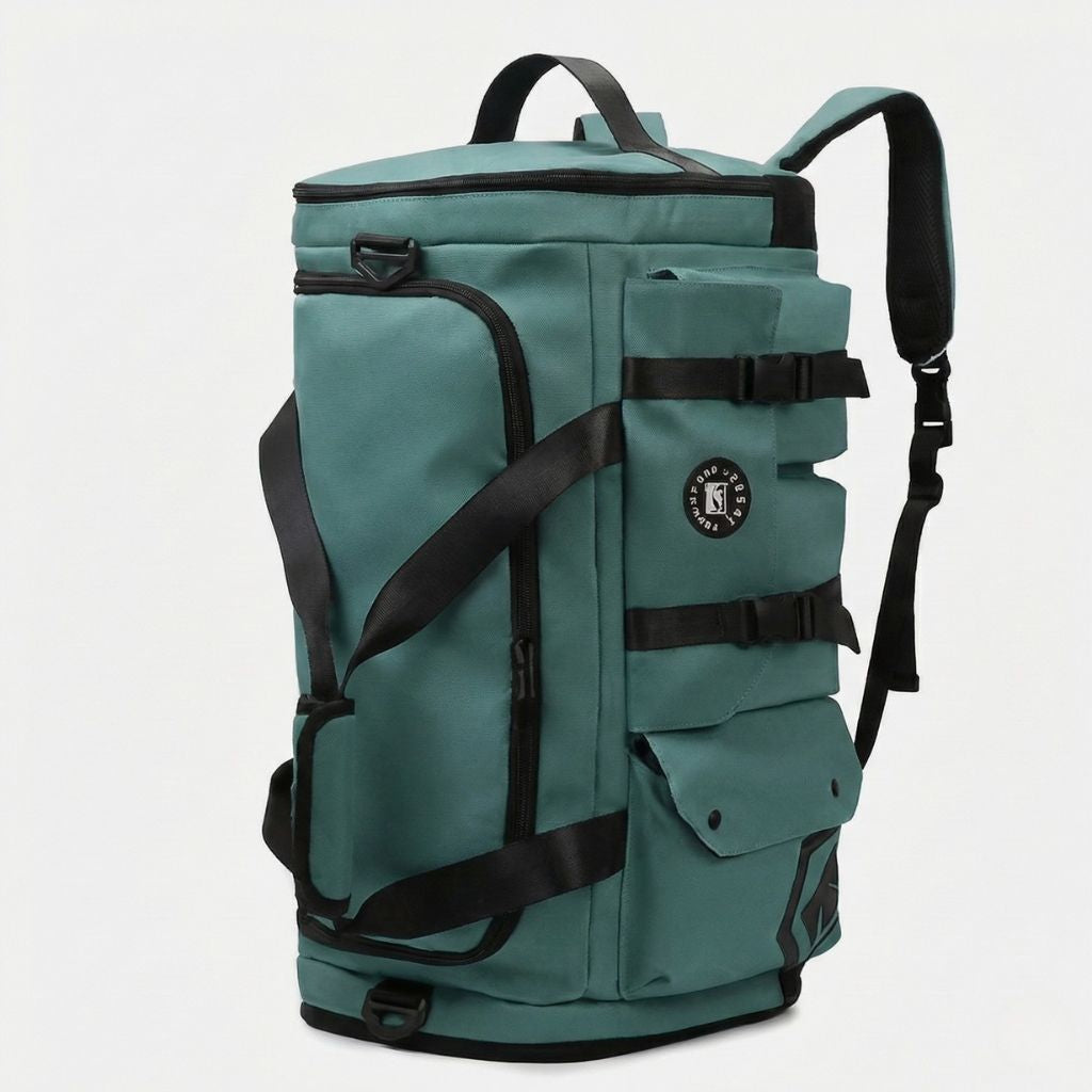 Vue 3/4 du sac convertible vert sarcelle porté en mode sac à dos avec bretelles et sangles
