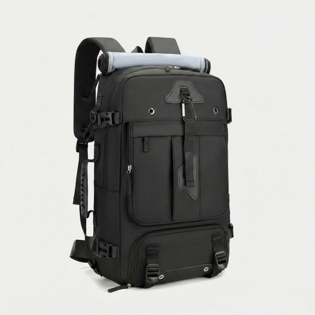 Grand sac à dos de voyage noir multi-poches avec tapis de yoga roulé au sommet, sangles de compression réglables