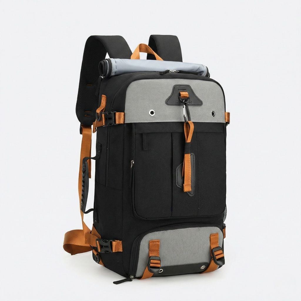 Sac à dos de voyage bicolore noir et gris clair avec accents caramel, tapis de yoga inclus, multi-sangles