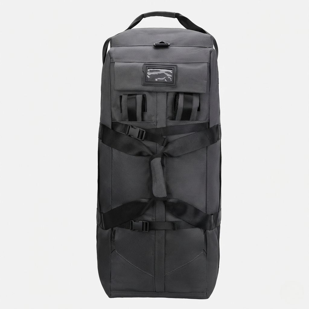 Vue arrière du sac gris anthracite avec bretelles rentrées et passant trolley central pour valise
