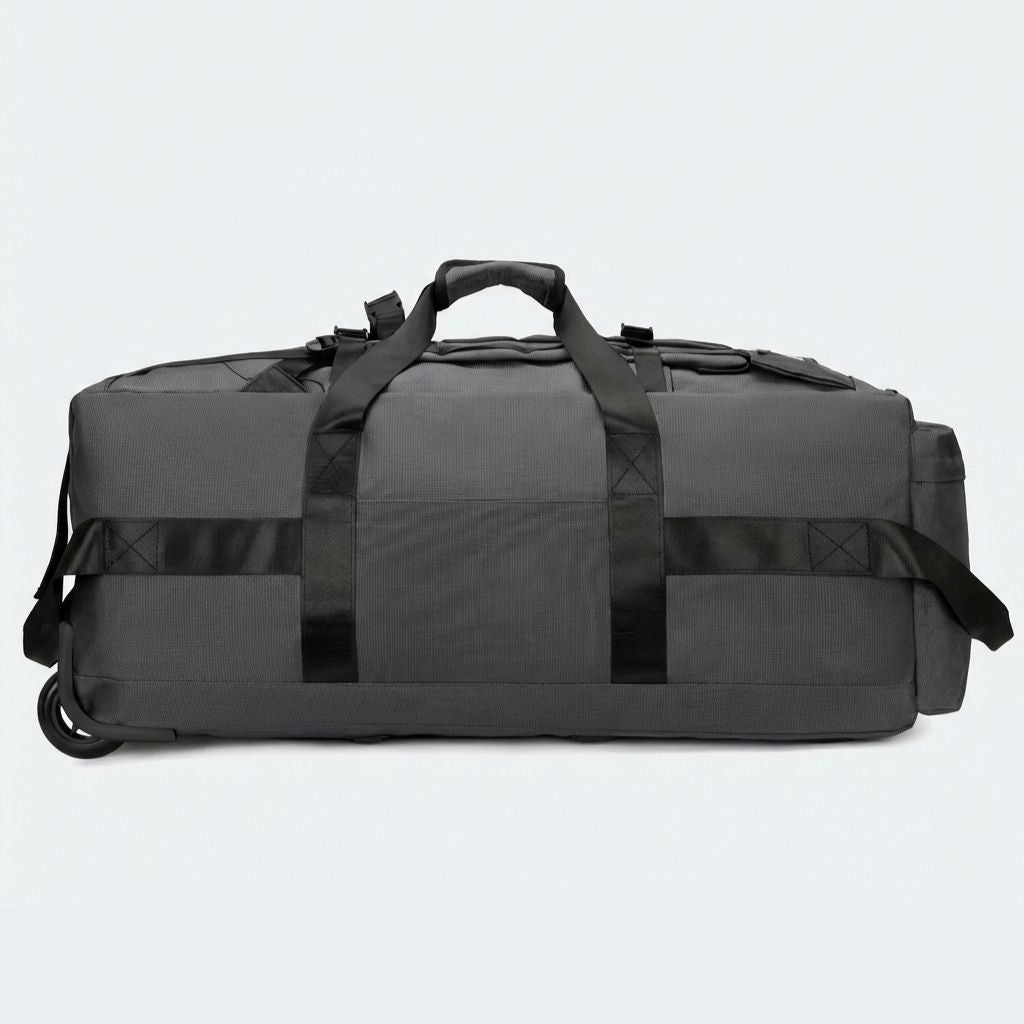 Dos du sac gris anthracite en mode vertical : bretelles sac à dos rentrées et sangles de compression visibles