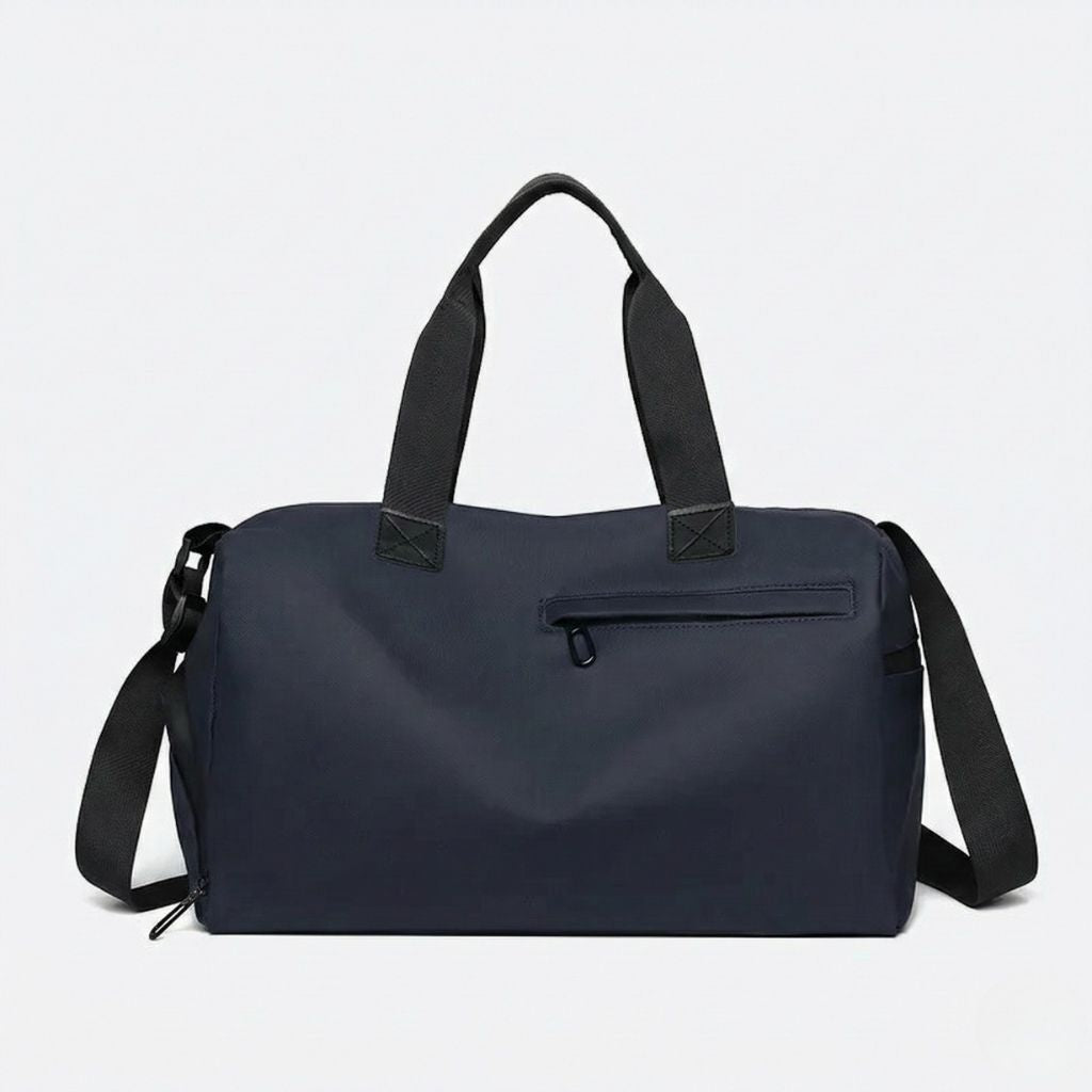 Petit sac de voyage imperméable bleu marine avec doubles poignées noires et poche frontale zippée