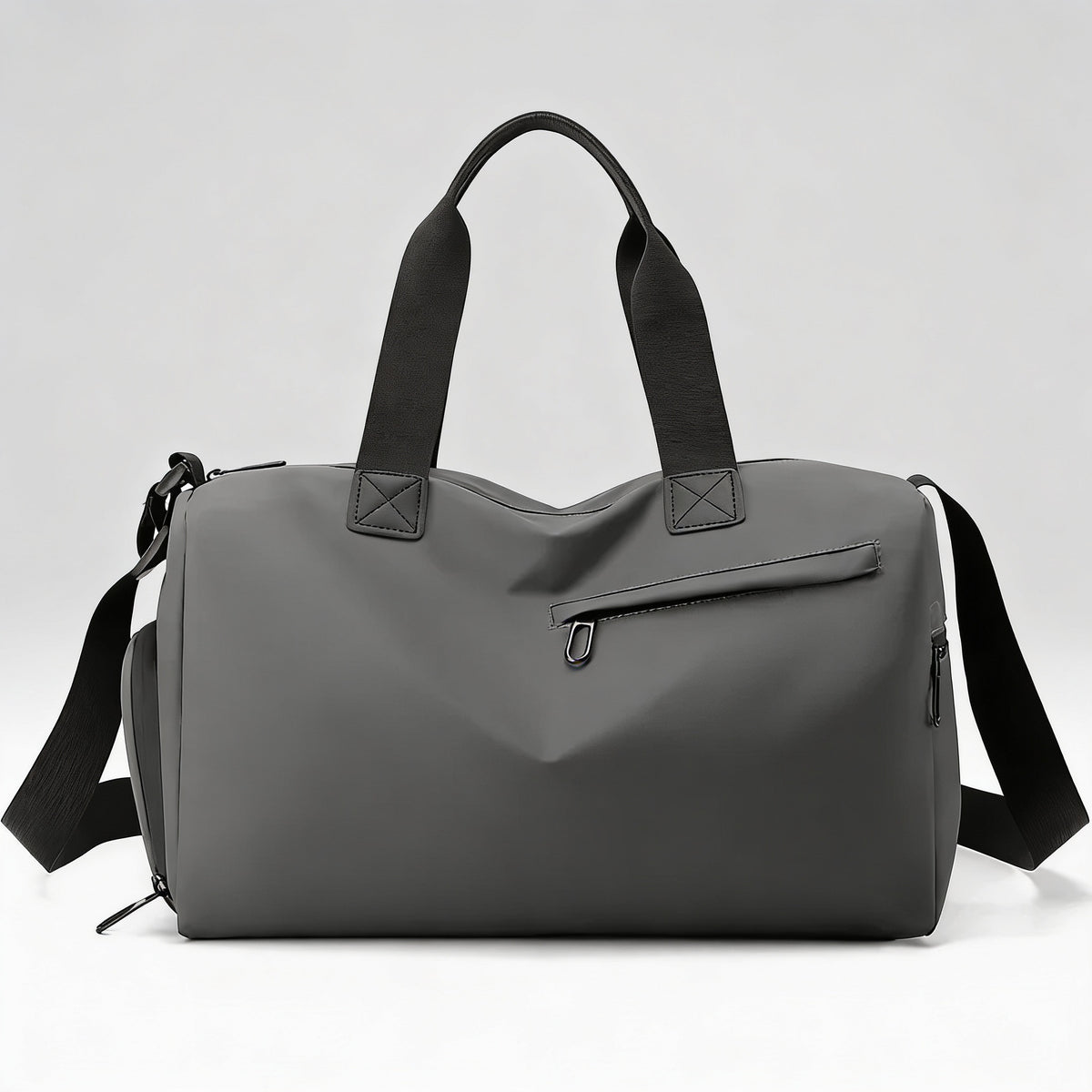 Sac sport et voyage homme gris foncé, vue de face, poche frontale zippée biseautée et anses noires