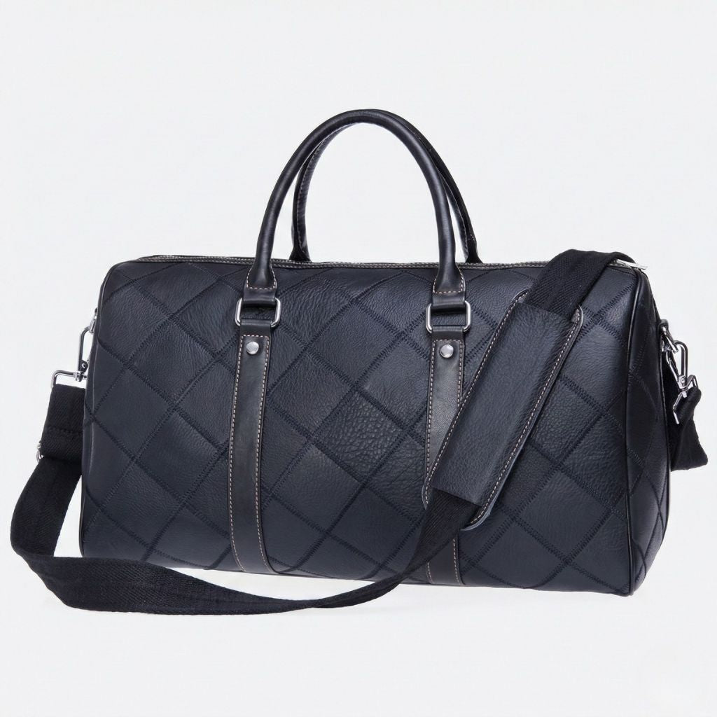 Sac de voyage cabine en cuir patchwork losanges noir avec bandoulière textile et quincaillerie argentée