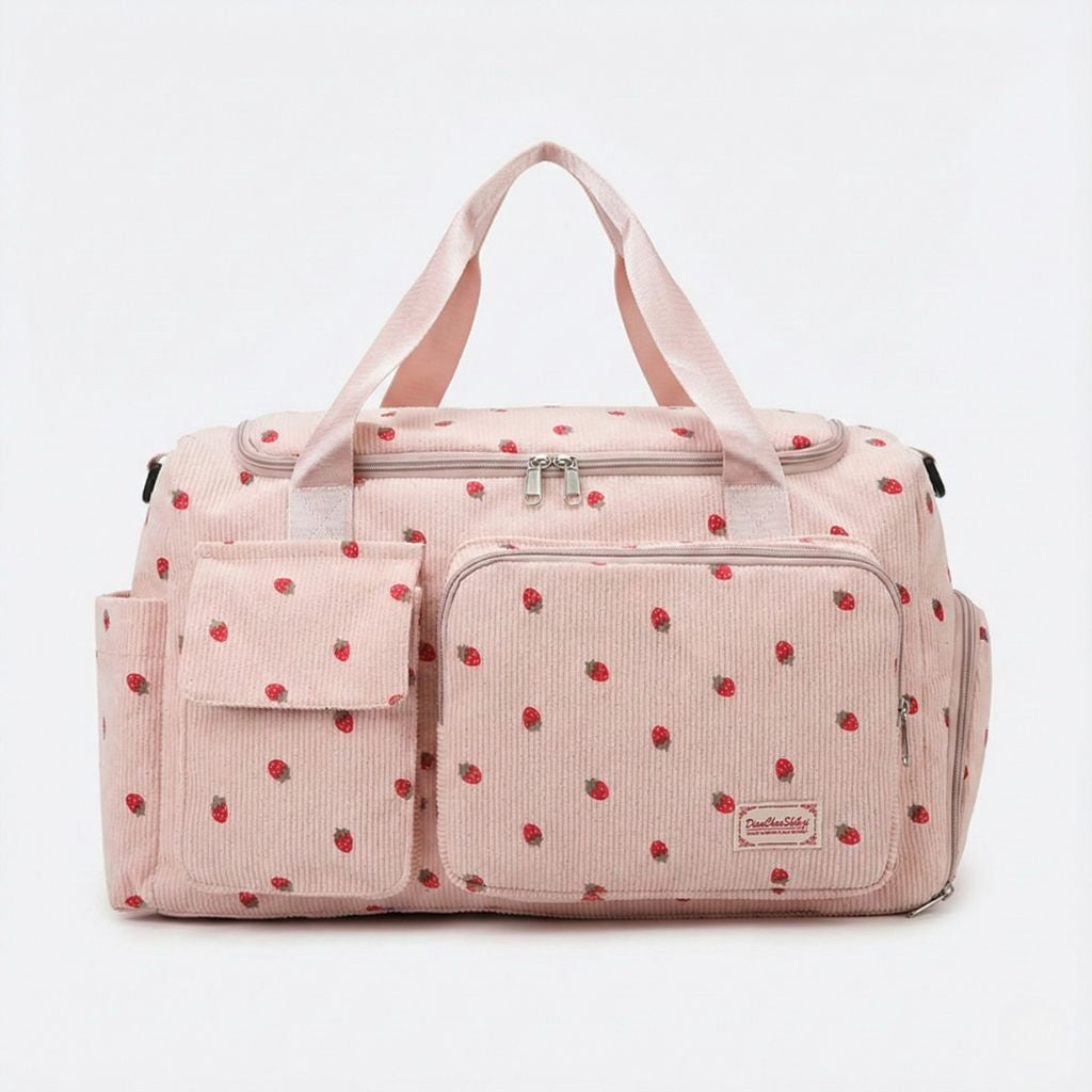 Sac week-end en velours côtelé rose à motif fraises avec double poignée et poches frontales zippées