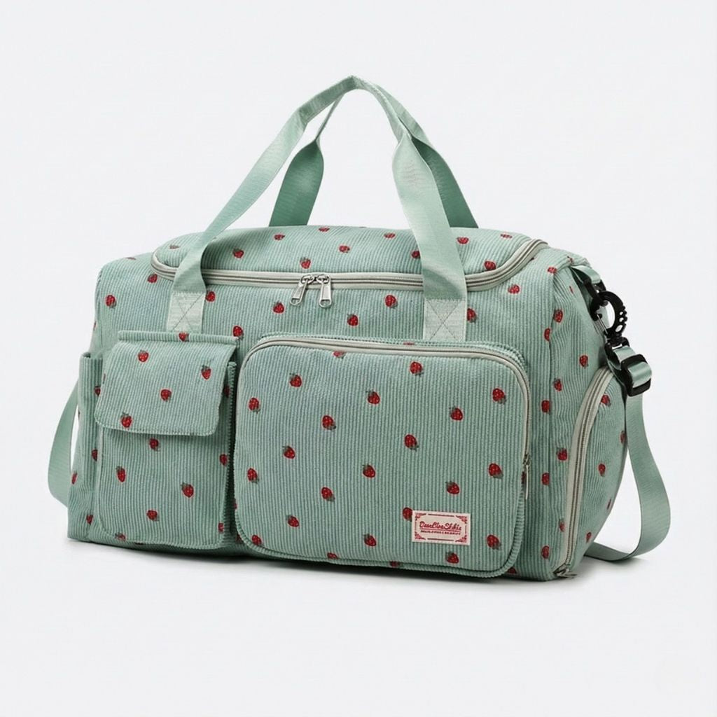 Sac week-end en velours côtelé vert à motif fraises avec double poignée et poches frontales zippées