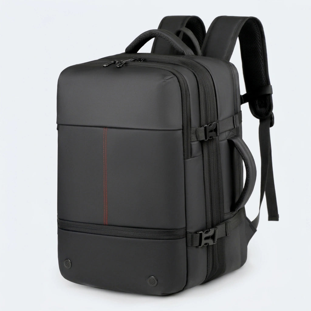 Sac à dos business extensible noir avec liseré rouge vu de trois quarts, sangles de compression latérales