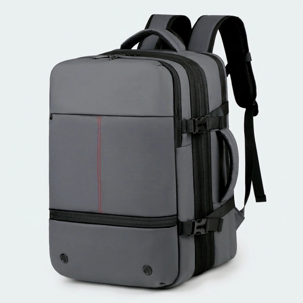 Sac à dos business extensible gris avec liseré rouge vu de trois quarts et bretelles rembourrées en mesh