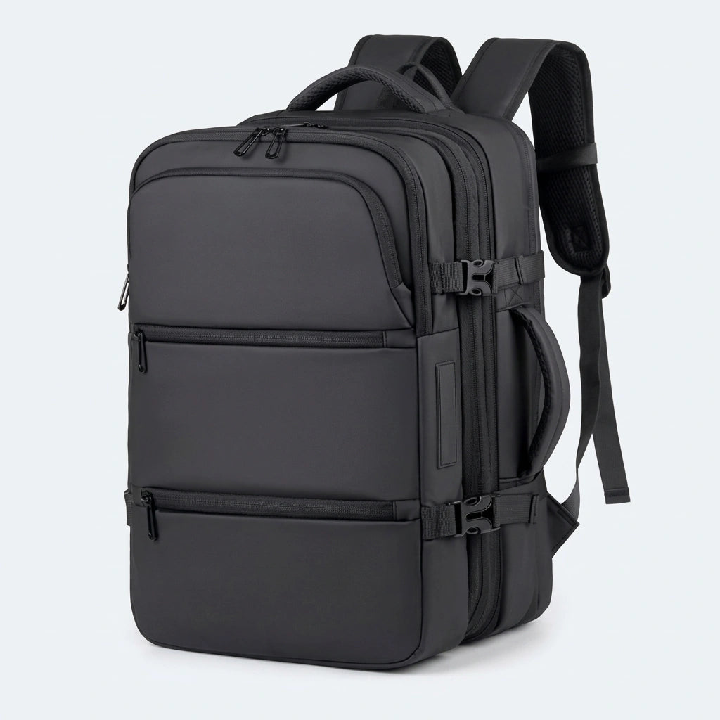 Sac à dos cabine noir vue trois-quarts montrant les poches frontales, sangles de compression et poignée