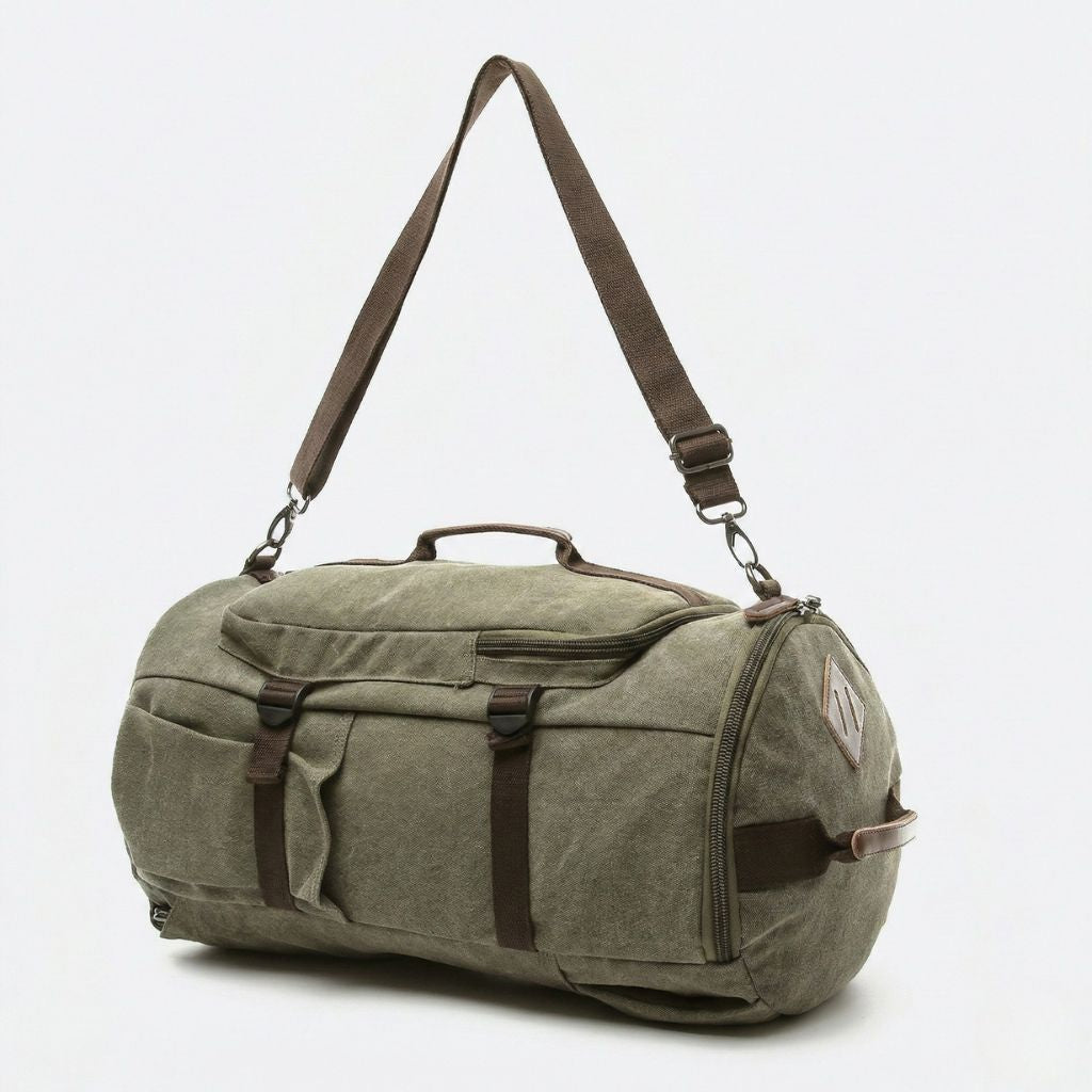 Sac de voyage vert militaire en mode duffle avec bandoulière longue réglable et sangles de fixation latérales