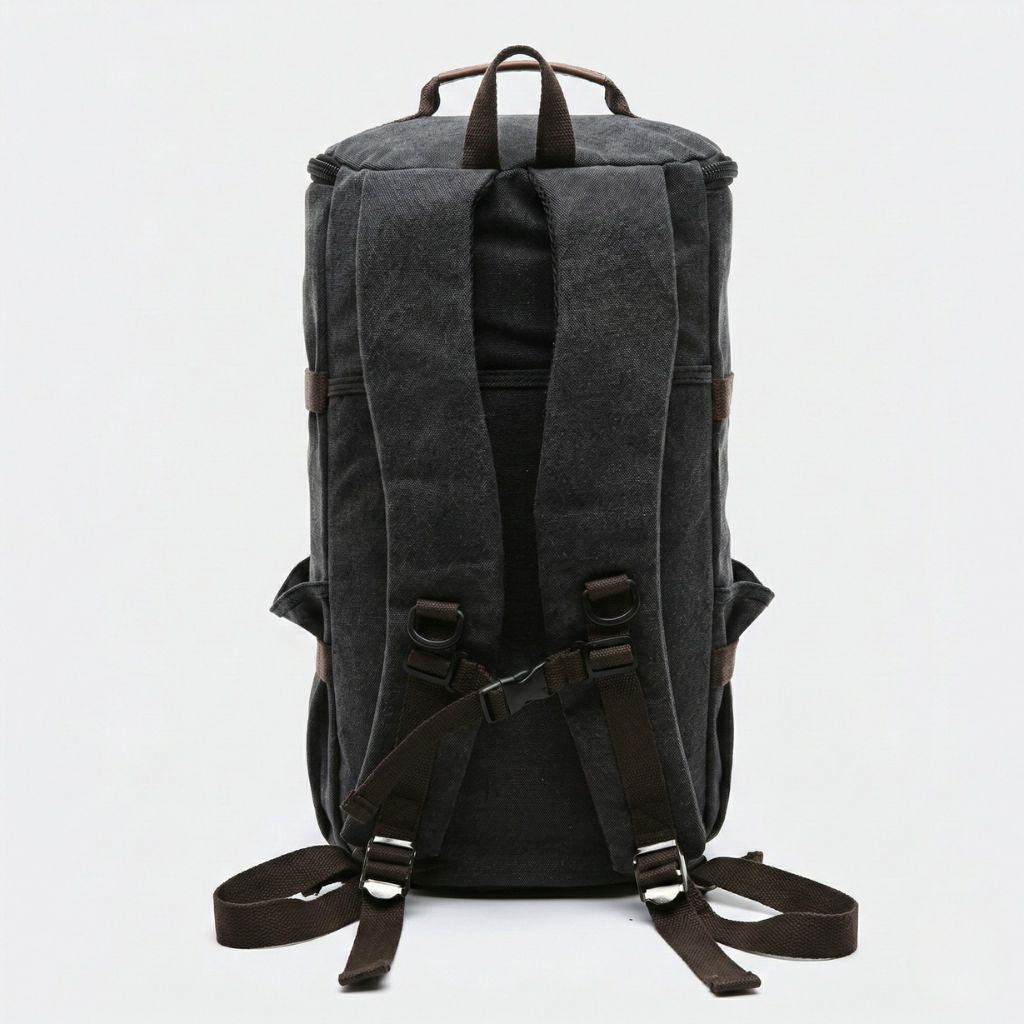 Dos du sac de voyage duffle noir anthracite avec bretelles larges rembourrées et système de sangle pectorale