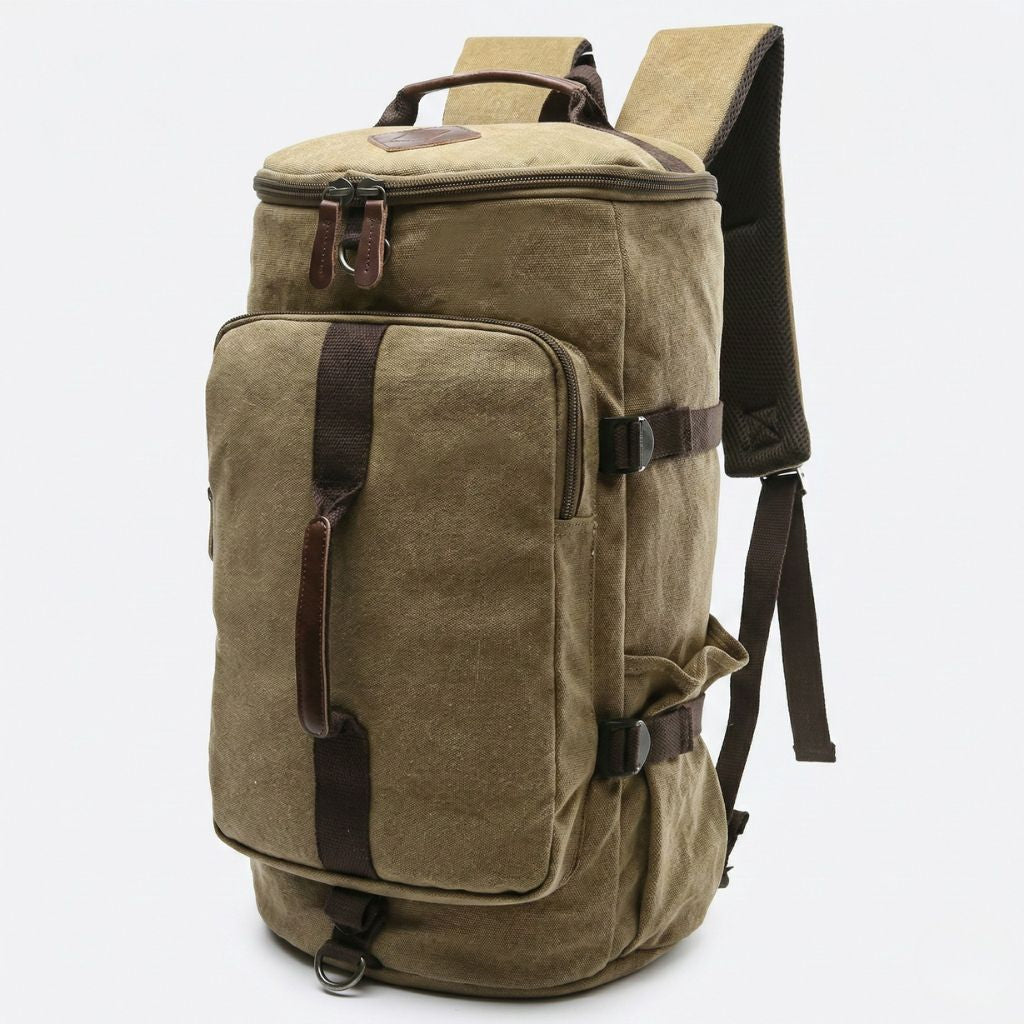 Sac à dos duffle convertible kaki en toile lavée, vue 3/4, grande poche frontale zippée et sangles réglables