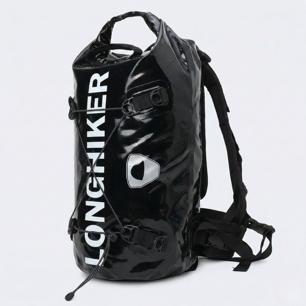 Sac étanche cylindrique noir 35L roll-top vue de trois quarts avec système de cordages croisés et clips