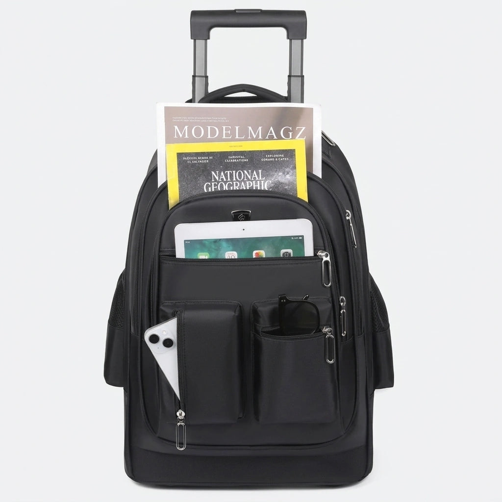 Poche frontale du sac à dos trolley 35L ouverte avec tablette, magazines, smartphone et lunettes