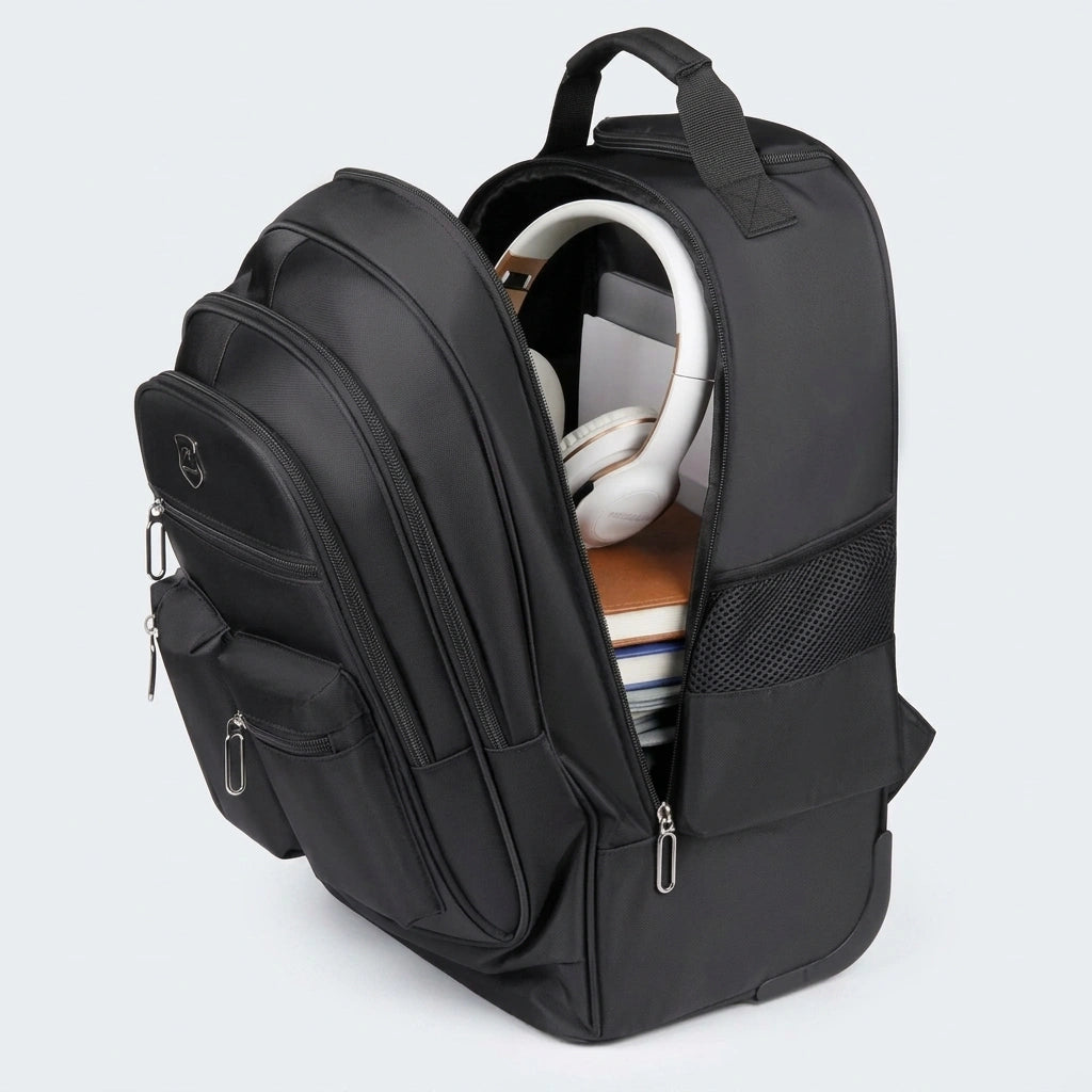 Compartiment principal du sac de voyage trolley 35L ouvert, casque blanc, carnets et jean plié Image