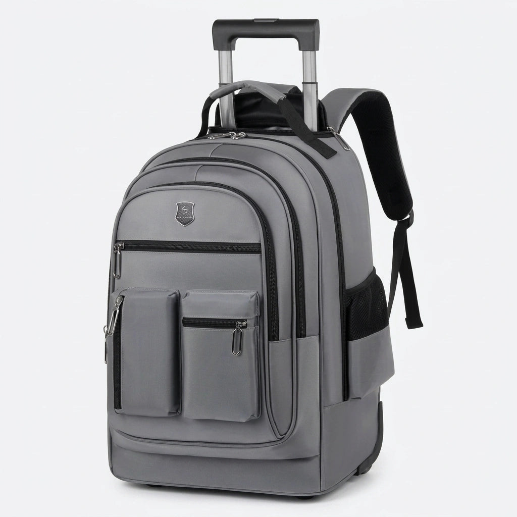 Sac à dos trolley gris 35L de face en mode portage, bretelles rembourrées et poches frontales