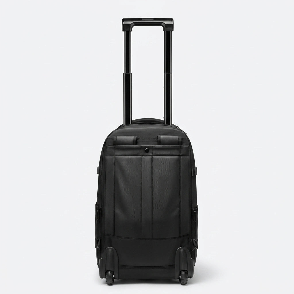 Vue arrière du sac à dos trolley 48L, bretelles ergonomiques, poignée déployée et roulettes noires