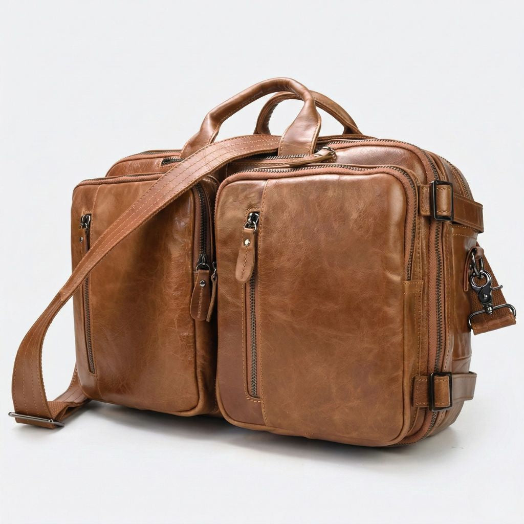 Sac cabine cuir vachette huilé cognac brillant, deux poches avant zippées et bandoulière textile