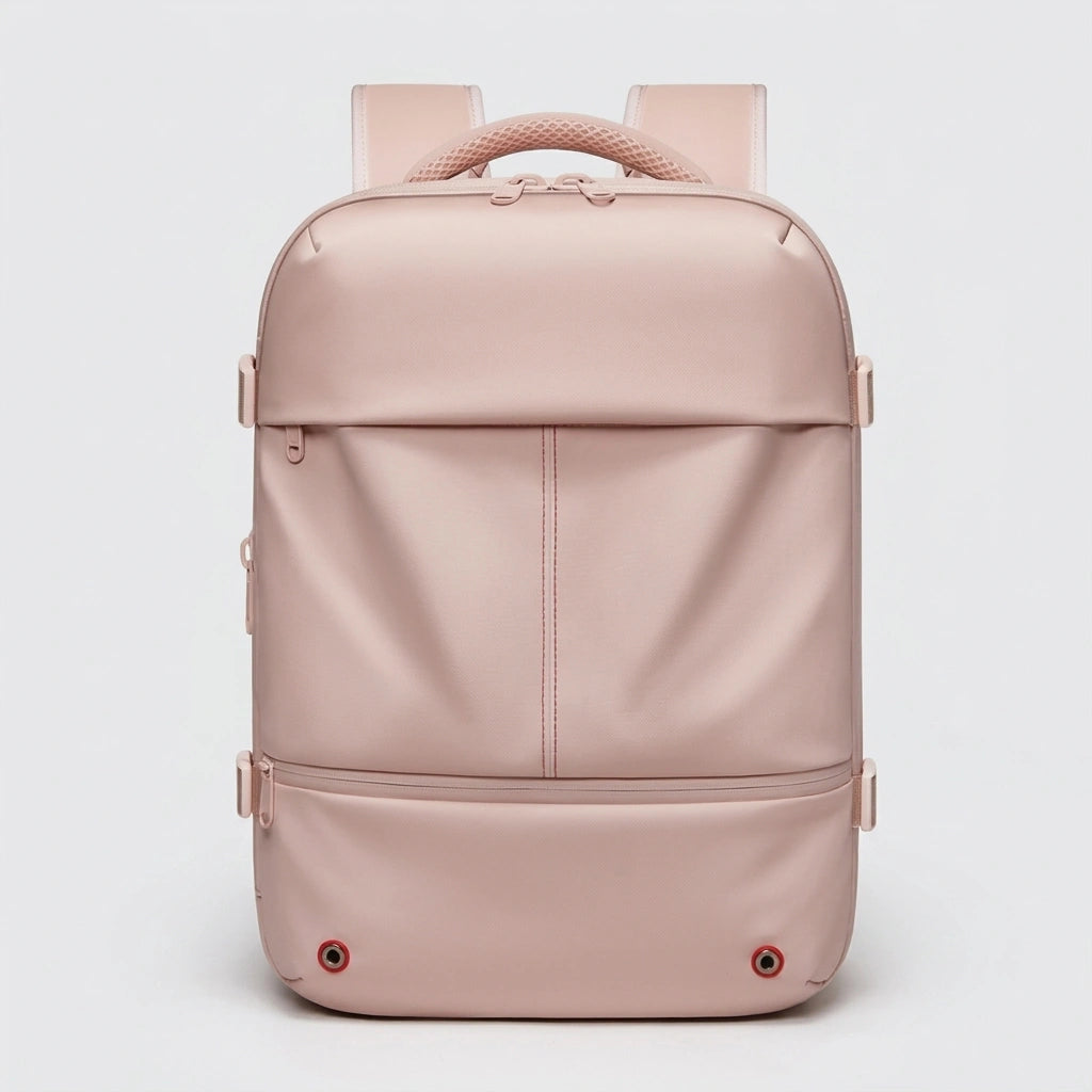 Sac à dos de voyage rose poudré vu de face avec surpiqûres centrales, poignée et bretelles assorties