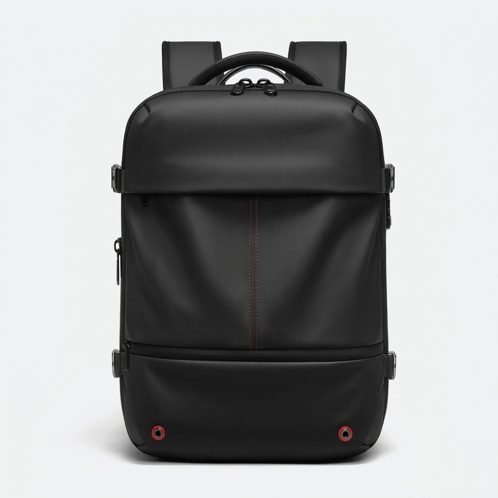 Sac à dos de voyage noir vu de face avec surpiqûres rouges centrales, sangles noires et œillets rouges
