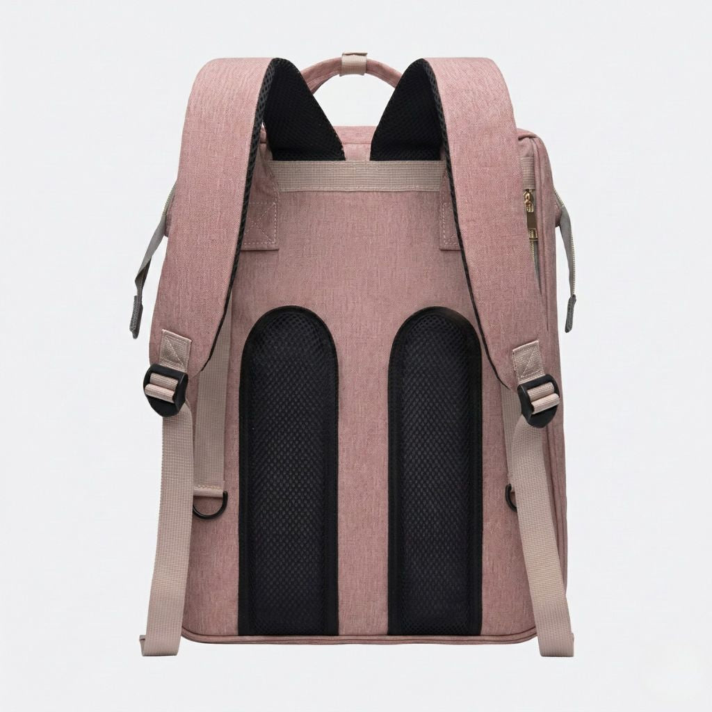 Dos du sac à langer rose poudré et gris : bretelles rembourrées maillées, passant trolley et zips dorés