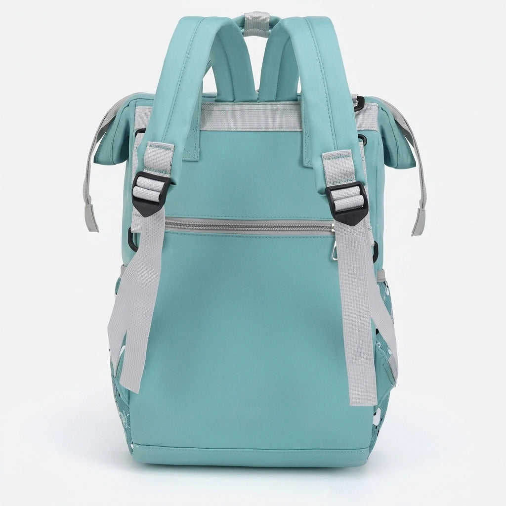 Dos du sac à dos à langer vert menthe avec bretelles ergonomiques et poche zippée dissimulée arrière