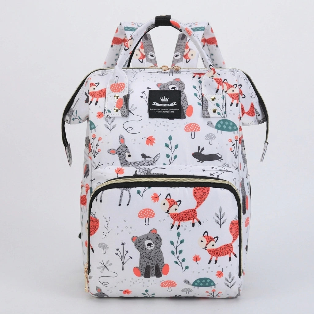 Sac à dos à langer blanc motif animaux de forêt renards et ours en couleurs vives, vue de face
