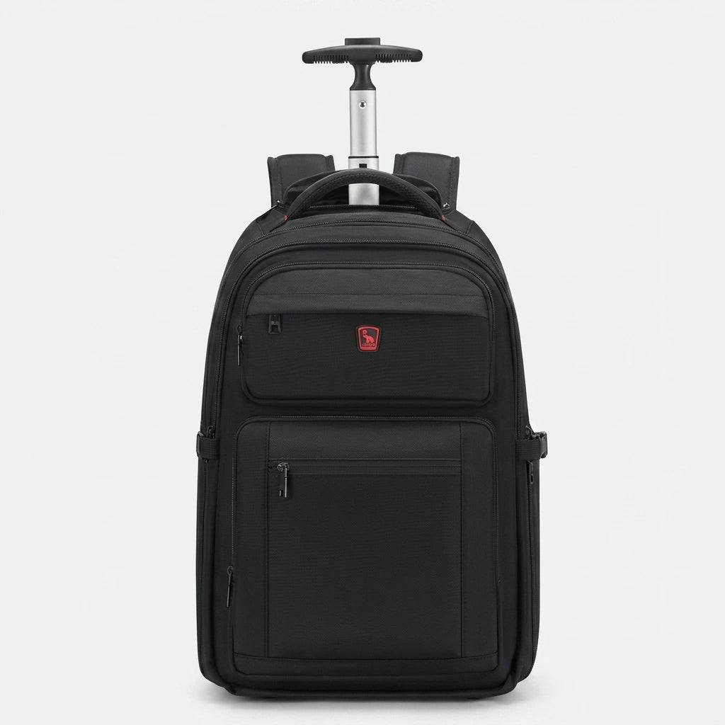 Sac à dos de voyage à roulettes noir de face, tige aluminium déployée et badge rouge distinctif