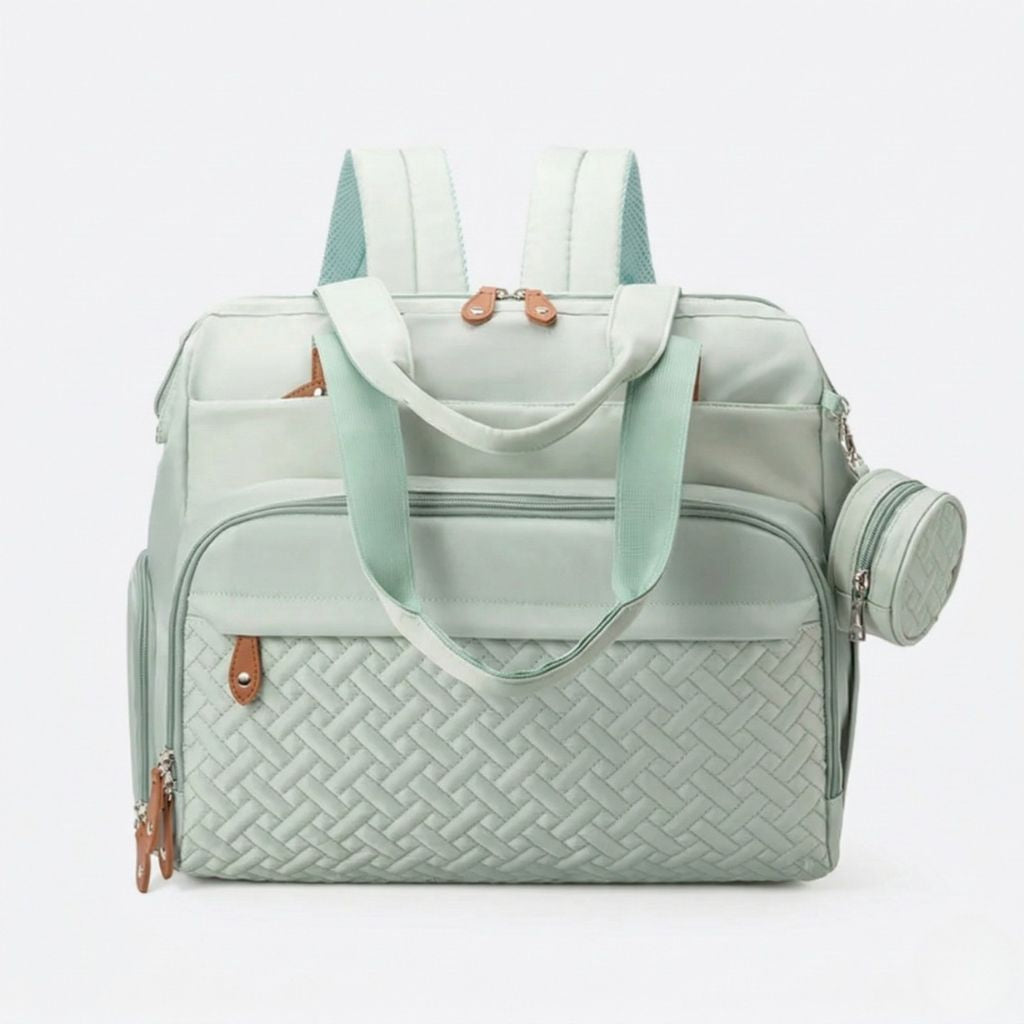 Sac à dos multifonctions vert menthe en mode tote bag : motif tressé en base, pochette ronde et détails cuir