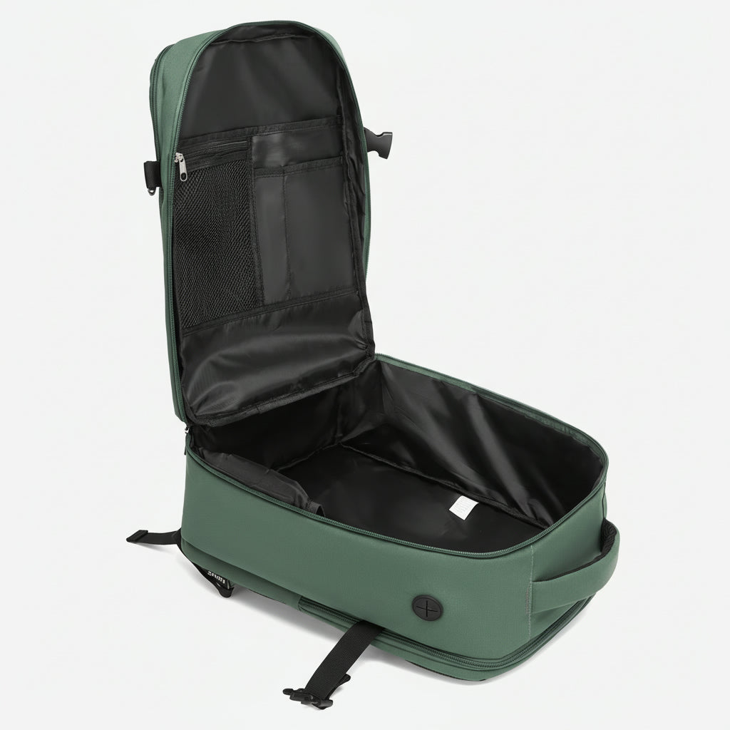 Intérieur du sac à dos vert sauge entièrement ouvert avec doublure noire et panneau organisateur mesh