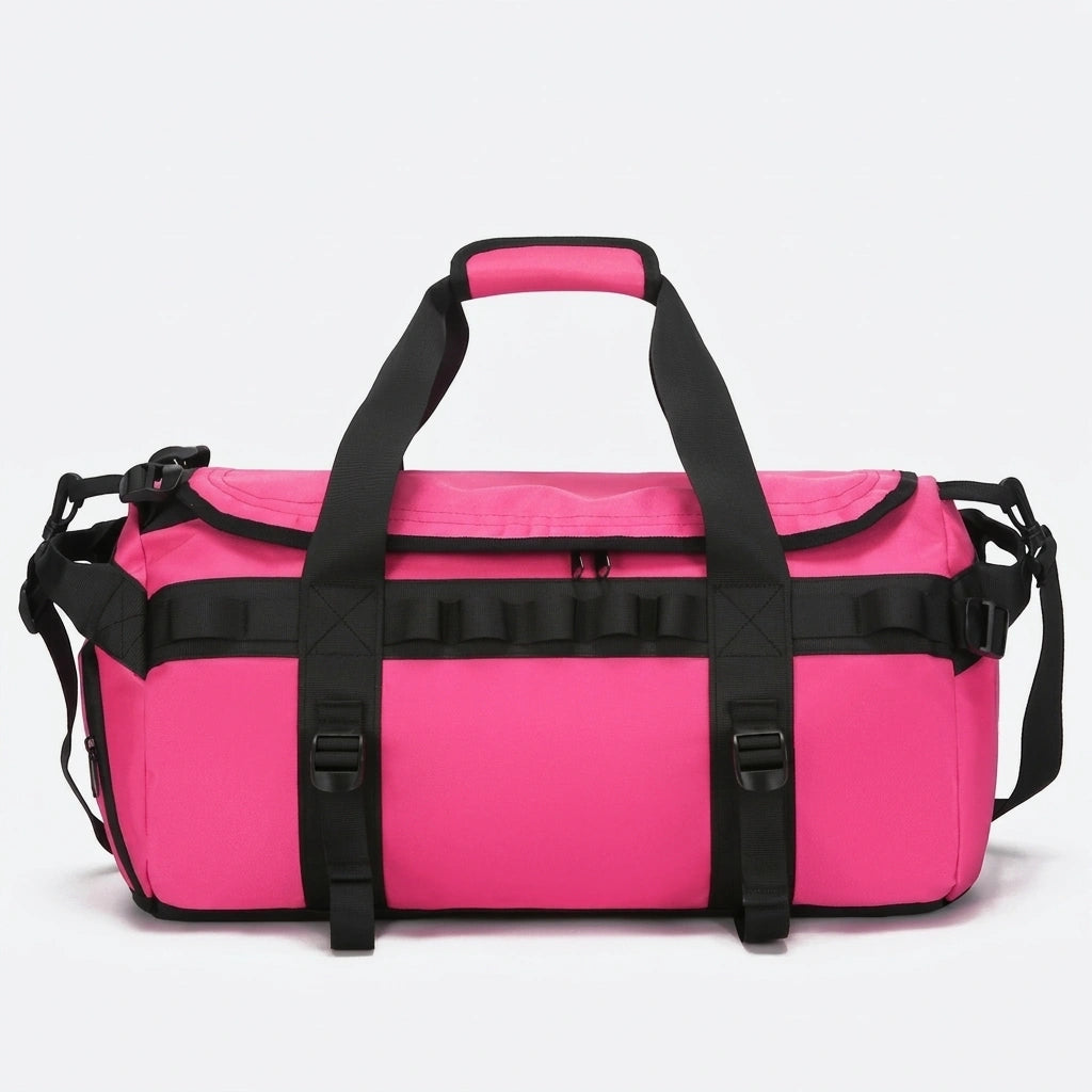 Sac de voyage duffle rose fuchsia avec sangles de compression noires et bandoulière amovible réglable
