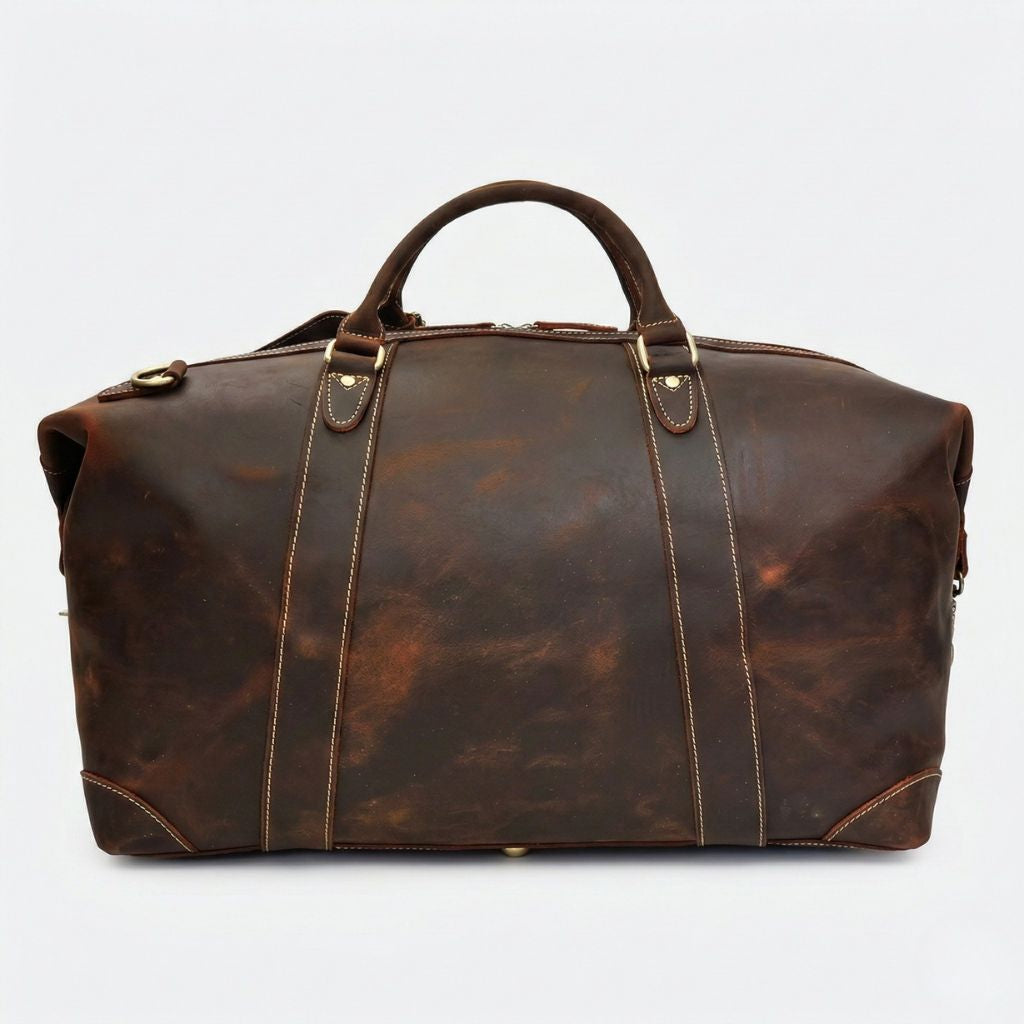 Dos du sac de voyage en cuir marron chocolat, face arrière sans étiquette et anneau de fixation latéral