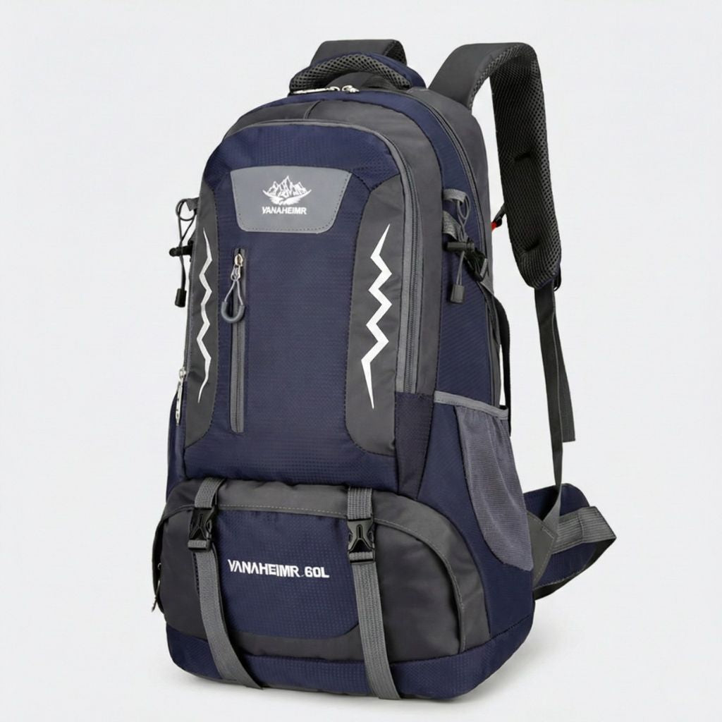 Sac à dos randonnée 60L bleu marine et gris foncé, bandes réfléchissantes zigzag, bretelles rembourrées et sangle.