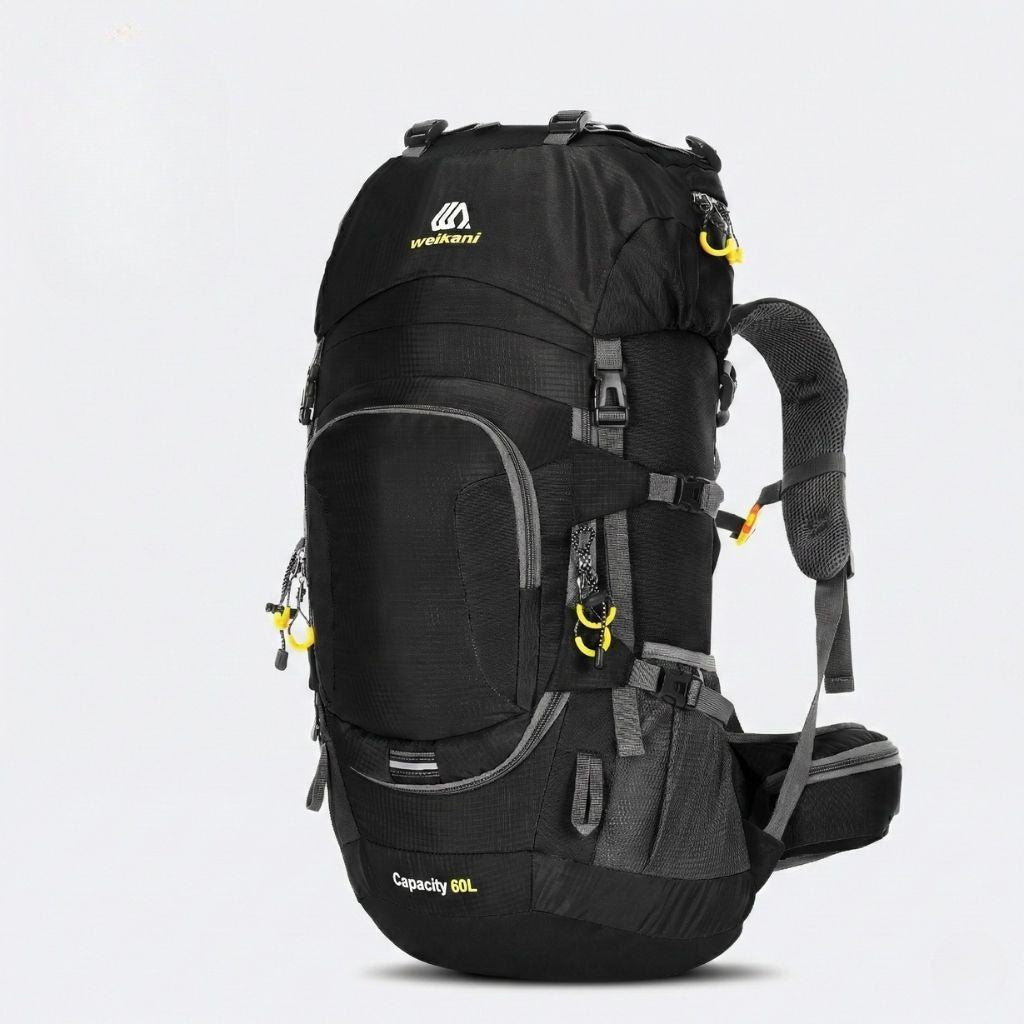 Sac à dos randonnée 60L noir avec détails jaunes, structure haute pour trekking et multiples poches zippées.