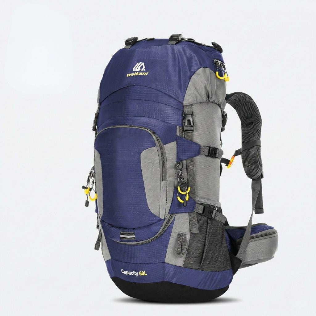 Sac à dos randonnée 60L bleu marine et gris, structure haute trekking, bretelles ergonomiques et poches zippées.