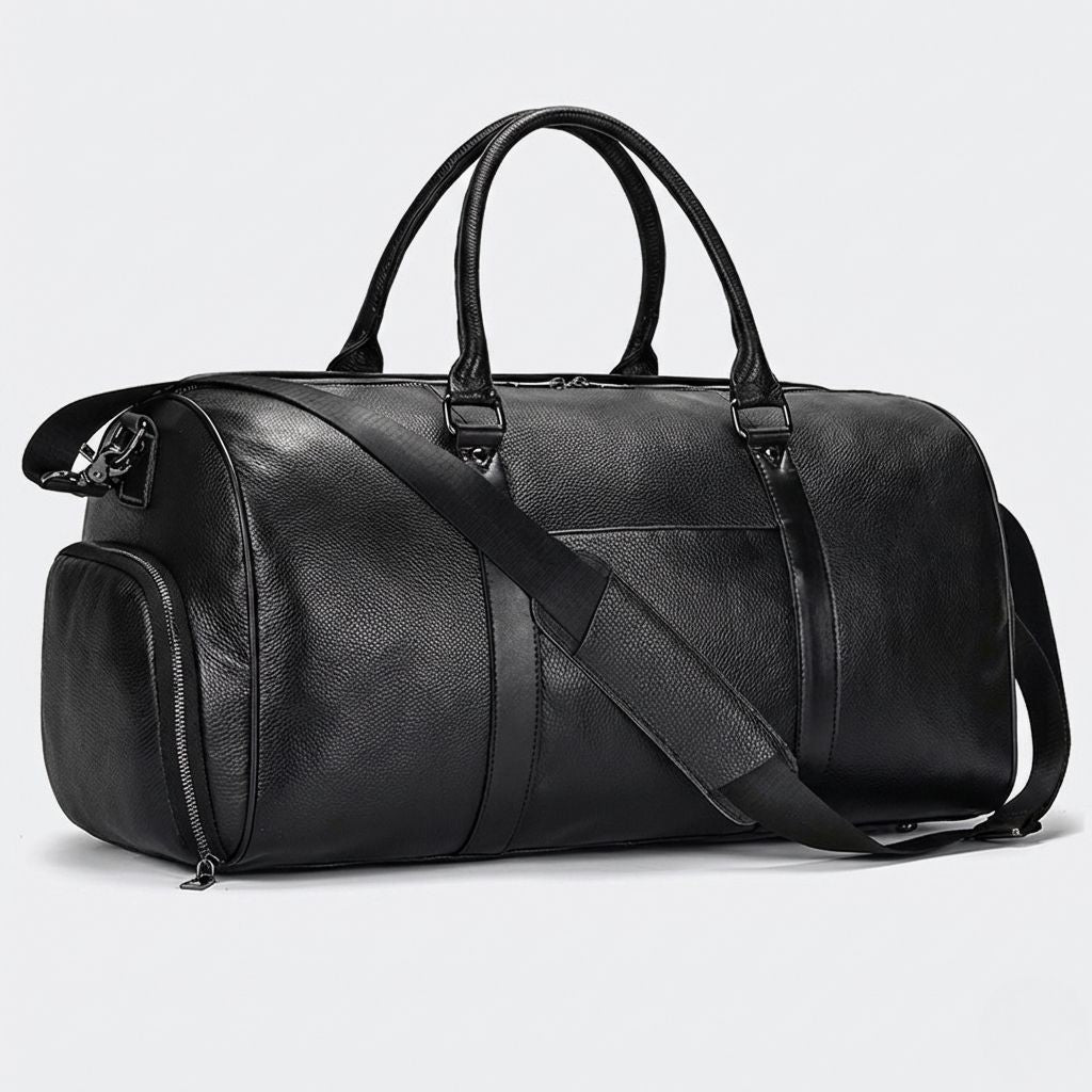 Sac de voyage cabine en cuir grainé noir avec poche à chaussures latérale et bandoulière réglable