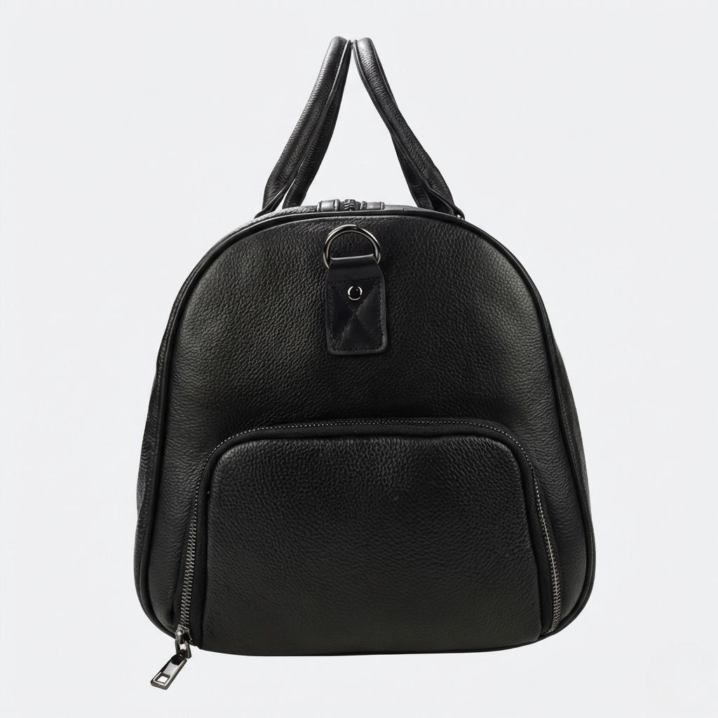 Profil latéral gauche du sac de voyage cuir grainé noir, poche extérieure et anneau D de fixation