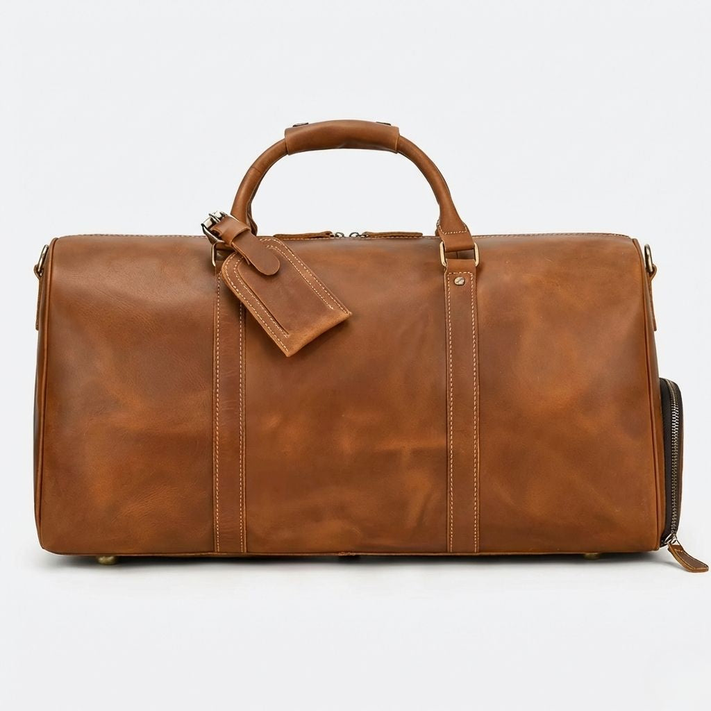 Sac de voyage cuir crazy horse cognac, face avant avec étiquette bagagiste et bandoulière cognac
