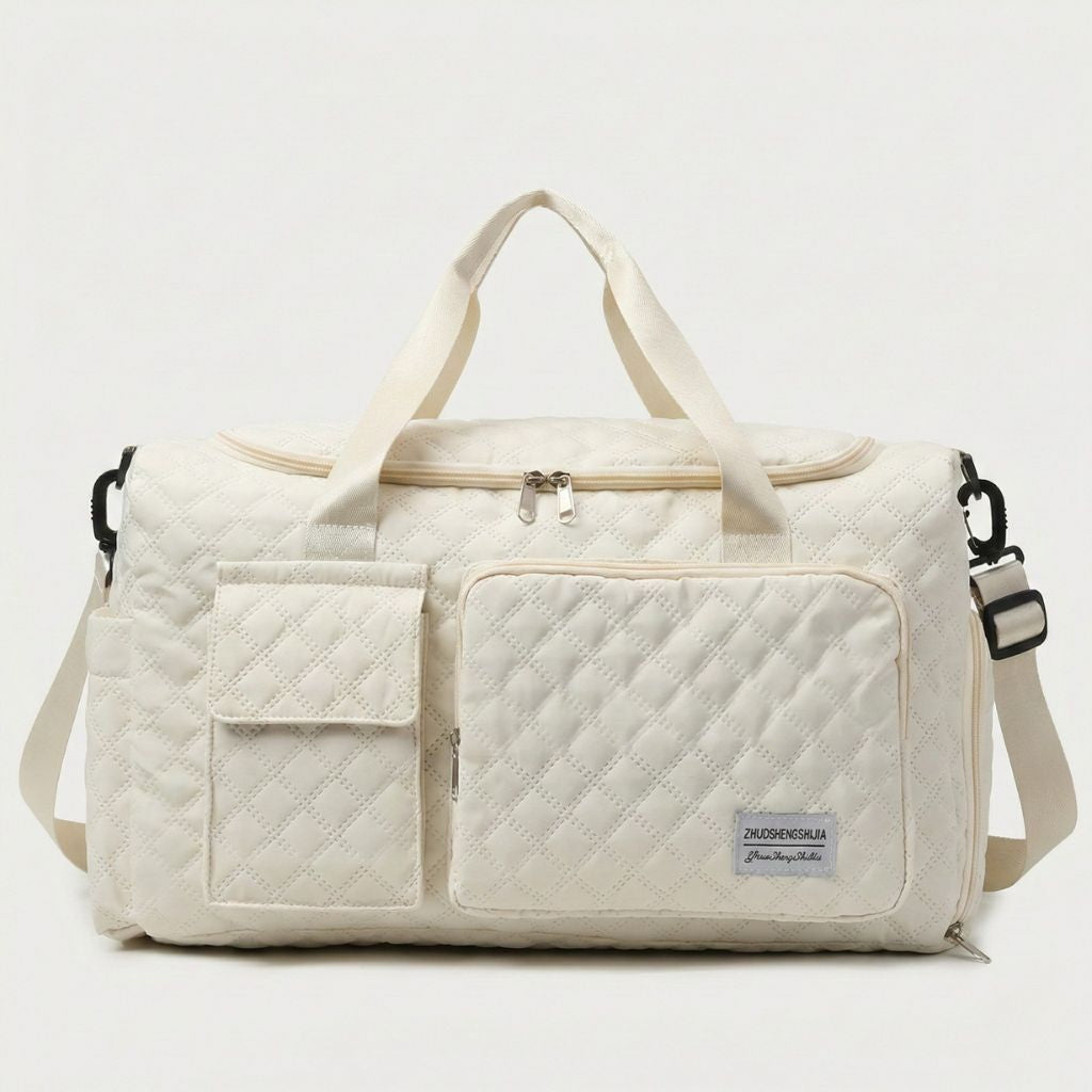 Sac de voyage femme cabine matelassé blanc cassé, vue de face, deux poignées, poche carrée et poche frontale zippée