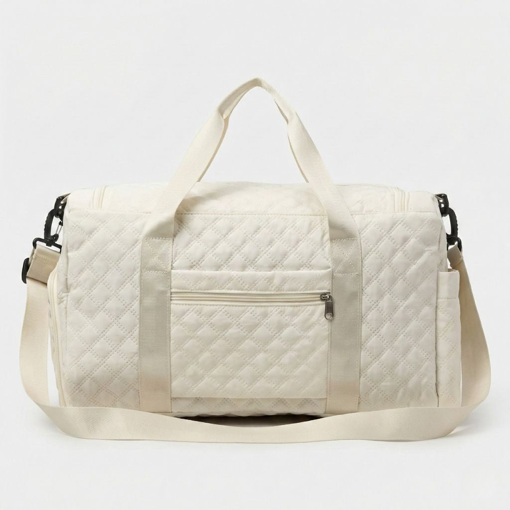Dos du sac de voyage femme matelassé blanc cassé, grande poche arrière zippée centrale et bandoulière réglable