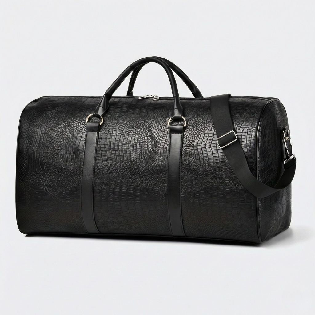 Sac de voyage en simili cuir noir effet crocodile, poignées et bandoulière noires avec ferrures en métal argenté