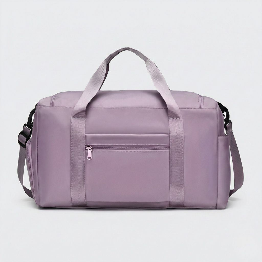 Dos du sac de voyage femme violet lilas en nylon satiné, grande poche arrière zippée et bandoulière réglable noire