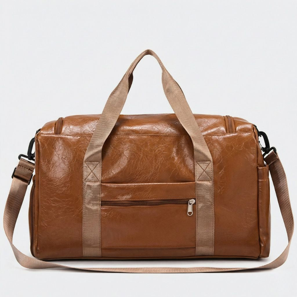 Dos du sac cabine cognac en simili-cuir vieilli avec poche zippée dos et sangles beiges croisées