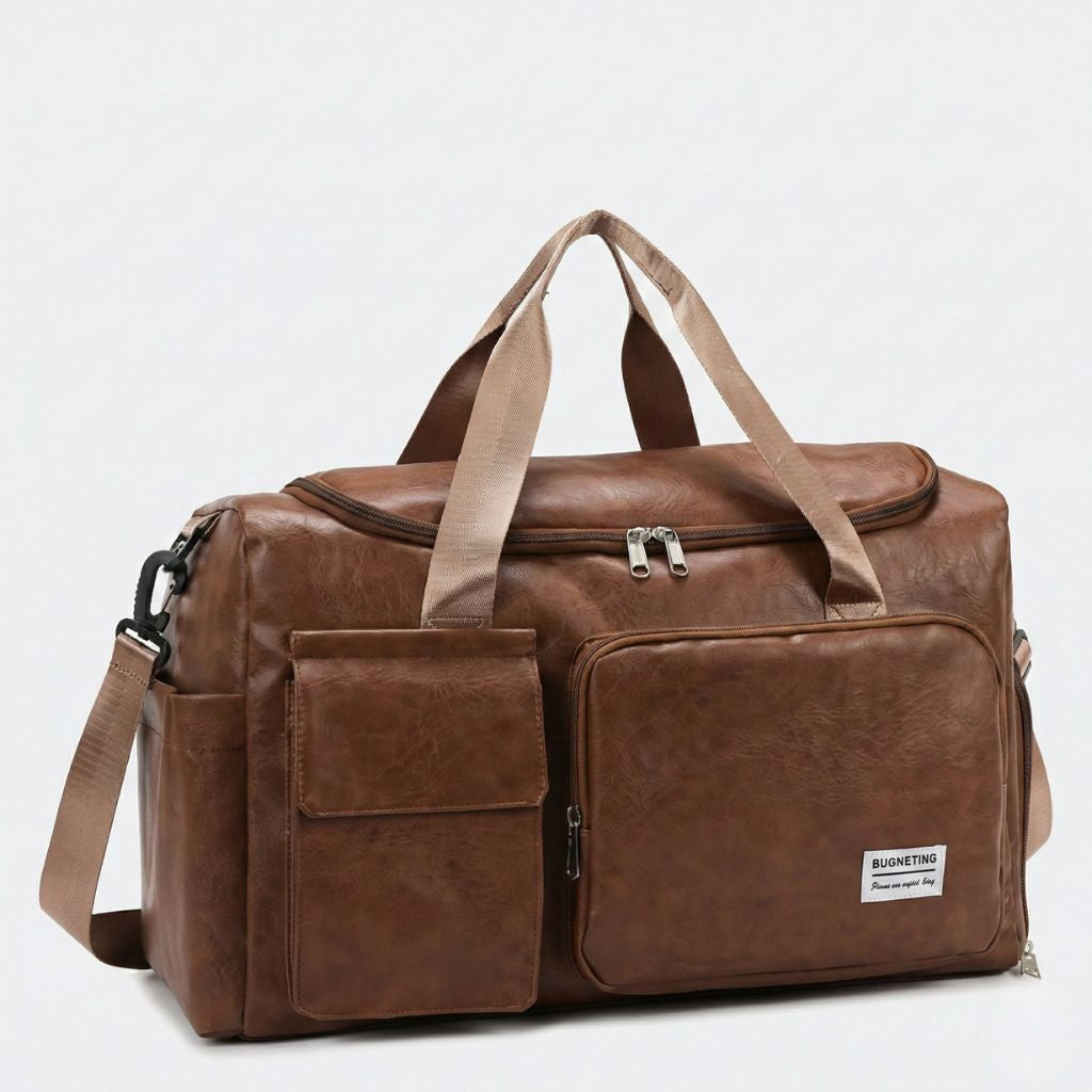 Sac cabine simili-cuir marron vieilli vu de trois quarts gauche, poche latérale et bandoulière